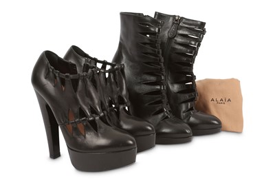 Lot 445 - Two Pairs of Alaia Black Boots, both with...
