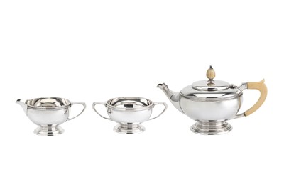 Lot 244 - A George VI sterling silver three-piece tea...
