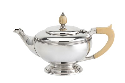 Lot 244 - A George VI sterling silver three-piece tea...