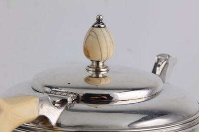 Lot 244 - A George VI sterling silver three-piece tea...
