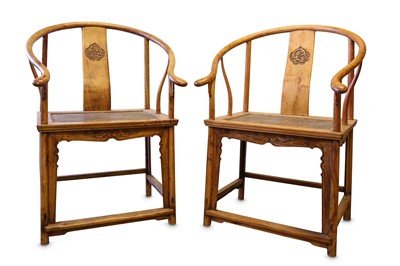 Lot 342 - A PAIR OF CHINESE HUANGHUALI CHAIRS. The...