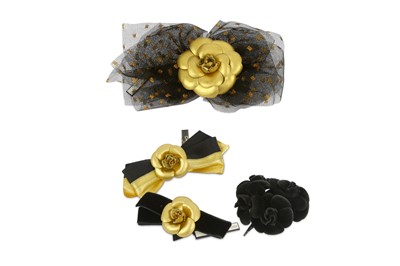 Lot 746 - Chanel Black and Gold Vintage Pins, to include...