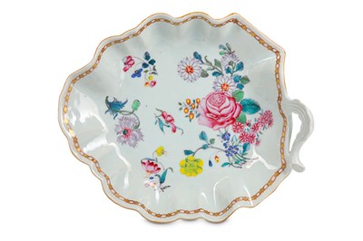 Lot 409 - A CHINESE FAMILLE ROSE LEAF-SHAPED DISH. Qing...