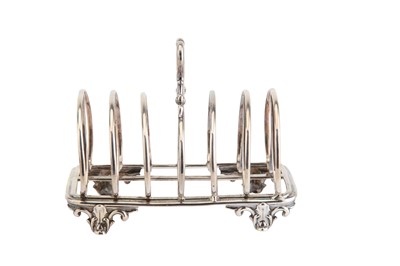 Lot 220 - A Victorian sterling silver seven bar toast...