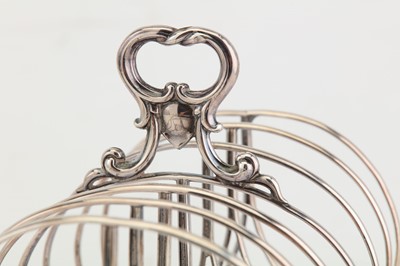 Lot 220 - A Victorian sterling silver seven bar toast...
