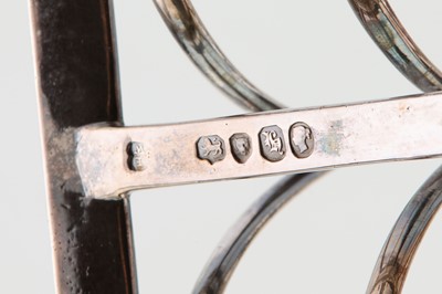 Lot 220 - A Victorian sterling silver seven bar toast...