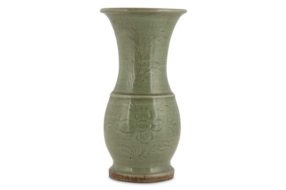 Lot 48 - A CHINESE CELADON VASE. Ming Dynasty. The pear-...