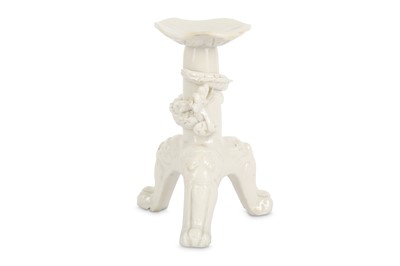 Lot 209 - A CHINESE BLANC DE CHINE CANDLE STICK. Qing...