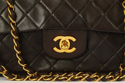 Lot 455 - Chanel Brown Classic 2.55 Flap Bag, c. 1991,...