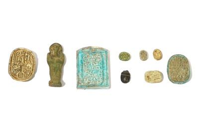 Lot 56 - A GROUP OF EGYPTIAN SCARABS AND AMULETS...