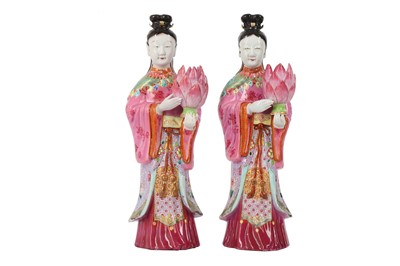 Lot 413 - A PAIR OF FAMILLE ROSE 'LADIES' CANDLE STICKS....