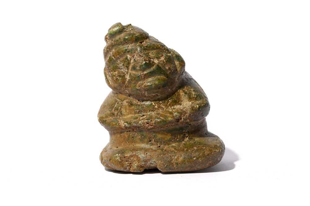 Lot 228 - AN OLMEC SEATED FIGURE Circa 800 - 100 B.C....
