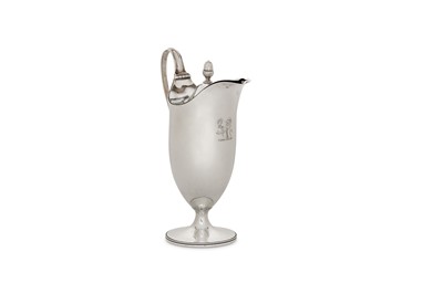 Lot 300 - A George III sterling silver lidded jug,...