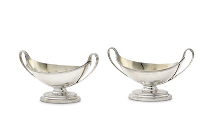 Lot 302 - A pair of George III sterling silver twin...