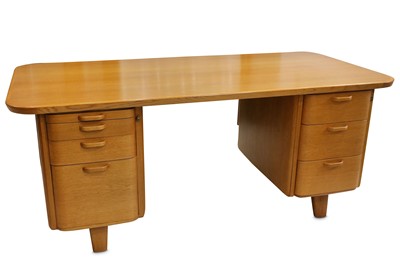 Lot 66 - SWEDISH- A large Desk, 1950s, oak, with two...