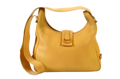 Lot 526 - Hermès Pale Yellow Tsako Shoulder Bag,...