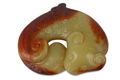 Lot 502 - A CHINESE YELLOW JADE ARCHAISTIC ANIMAL GROUP....