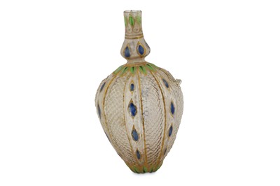 Lot 225 - A GILT AND ENAMELLED MOULD-BLOWN MUGHAL GLASS PERFUME BOTTLE