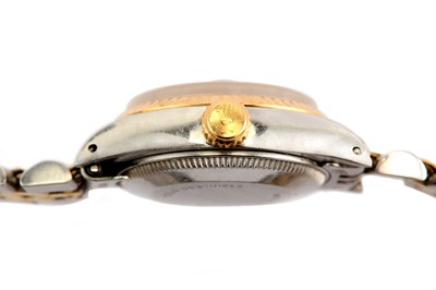 Lot 335 - ROLEX. A LADIES STAINLESS STEEL AND GOLD...
