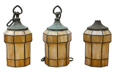 Lot 823 - Arts and Crafts, a set of three hall lanterns...