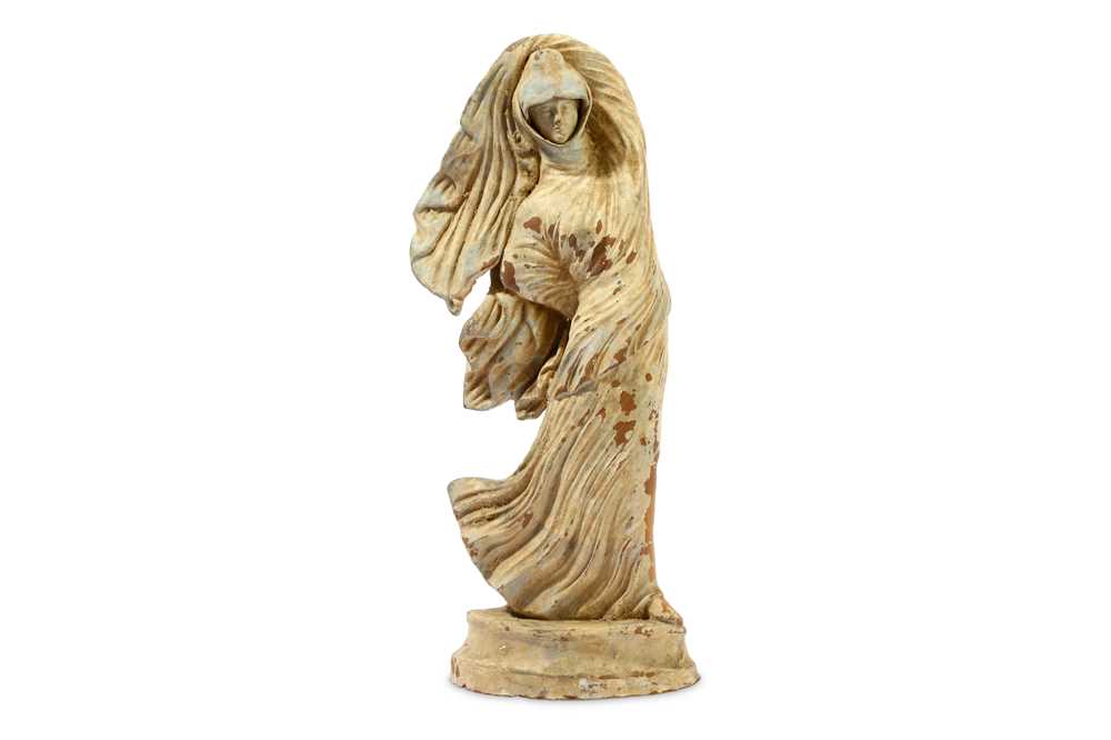 Lot 111 - A 'GRAND TOUR' TANAGRA FIGURE The figure...
