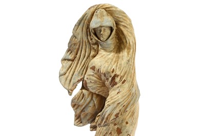 Lot 111 - A 'GRAND TOUR' TANAGRA FIGURE The figure...