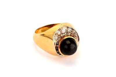 Lot 380 - A star diopside and diamond ring, the cabochon...