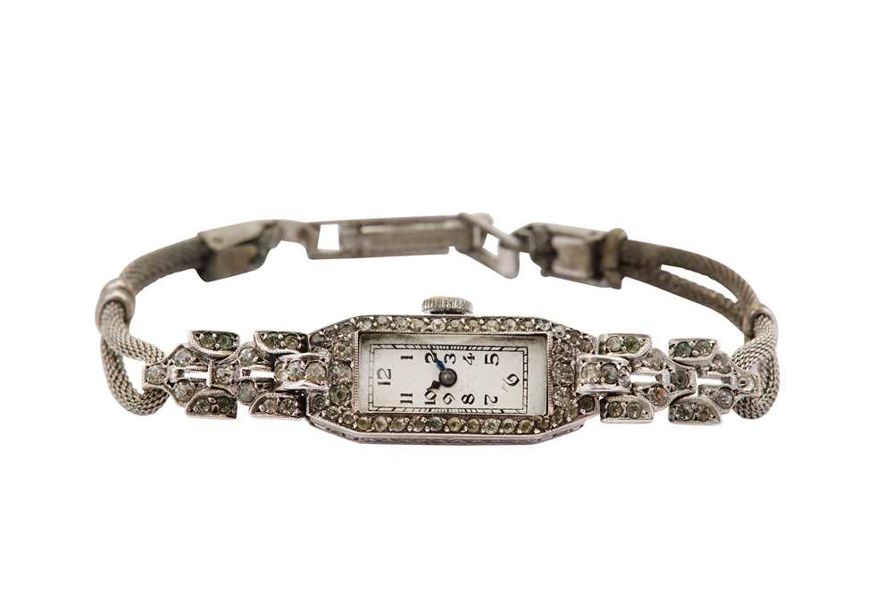 Lot 595 - COCKTAIL WATCH. A LADIES SILVER BRACELET WATCH...