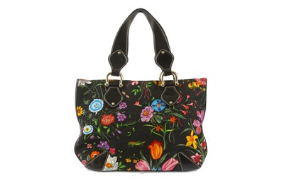 Lot 707 - Gucci Floral Canvas Tote, black ground with...