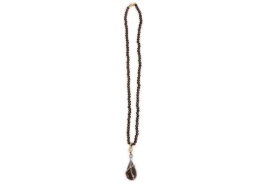 Lot 345 - A smoky quartz necklace, the pear-shaped...