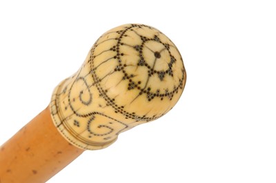 Lot 169a - A William III turned ivory and piqué work cane...
