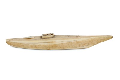 Lot 175 - A RARE INUIT CARVED WALRUS IVORY MODEL OF A...