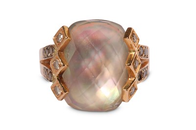Lot 308 - A faceted mother of pearl and diamond ring,...