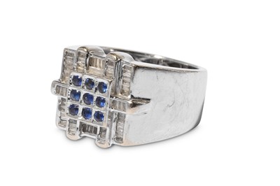 Lot 310 - A sapphire and diamond dress ring, the...