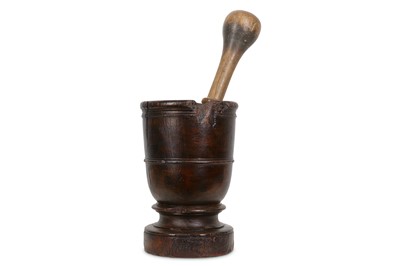 Lot 310 - TREEN: A LARGE CARVED WOOD MORTAR WITH...