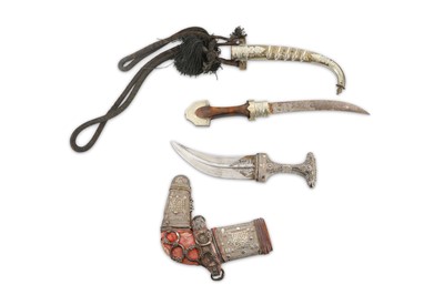 Lot 443 - An Arab white metal mounted Jambiya or dagger...