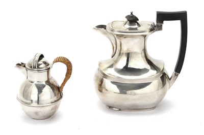 Lot 7 - A George V sterling silver hot water pot,...