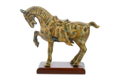 Lot 668 - A modern patinated metal horse figure,...