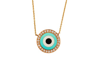 Lot 126 - A gem-set pendant, of target design, set with...