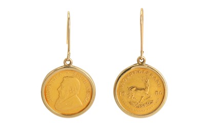 Lot 130 - A pair of coin earrings, each set with a 1/10...