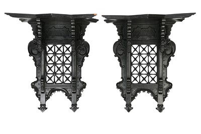 Lot 300 - A PAIR OF CARVED WOOD AND EBONISED WALL...