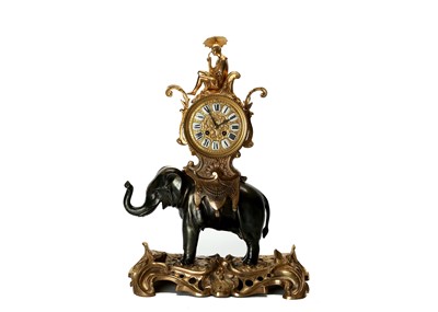 Lot 148 - A  ROCOCO STYLE GILT AND PATINATED BRONZE...