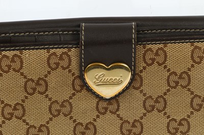 Lot 212 - Gucci Brown Monogram Canvas Wallet