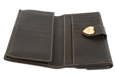 Lot 212 - Gucci Brown Monogram Canvas Wallet