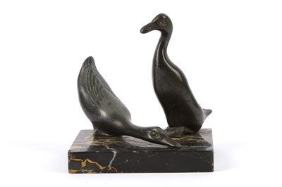 Lot 723 - An Art Deco spelter model of two ducks, signed...