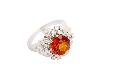 Lot 150 - A citrine and diamond dress ring, the circular-...
