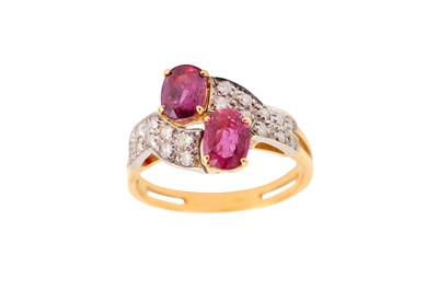 Lot 145 - A garnet and diamond dress ring, of crossover...