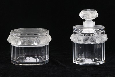 Lot 480 - A Lalique glass Robinson pattern powder jar...