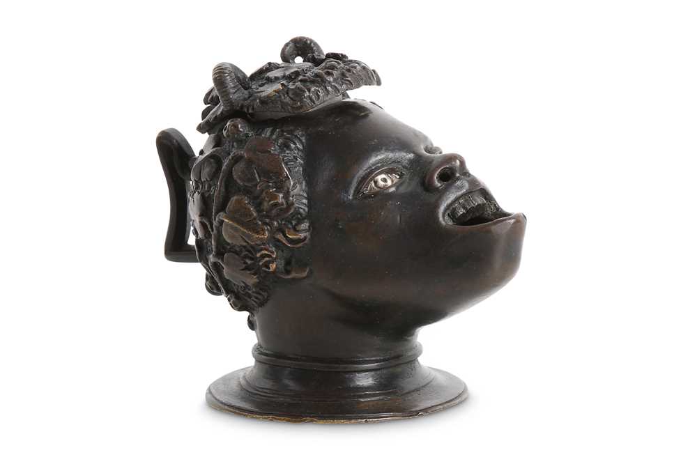 Lot 38 - A SMALL BRONZE OIL LAMP IN THE MANNER OF...