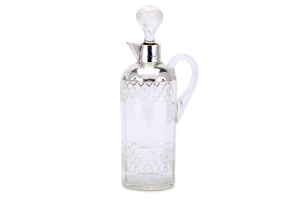 Lot 579 - An Edwardian cut glass claret jug, of...